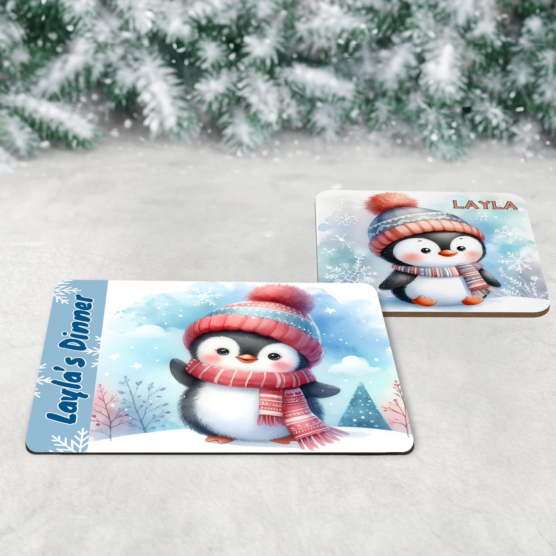 Personalised Mug, Coaster and Placemat set for Childrens Christmas. Featuring soft, adorable penguins dressed in hats and scarves and customised with childrens name