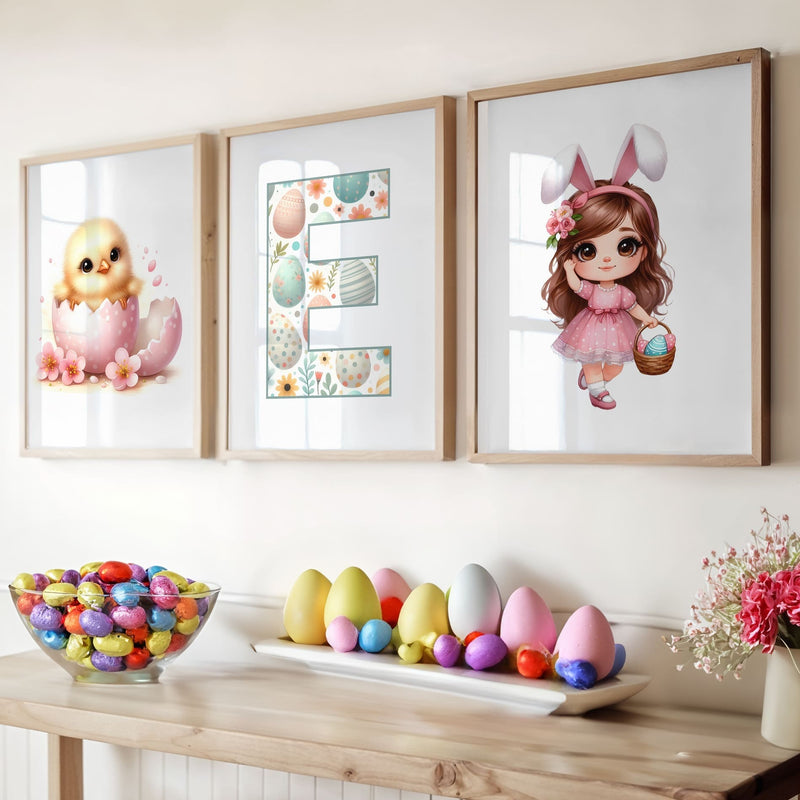 Three Easter Framed Childrens prints - one brown haired girl dressed as bunny, a chick, and a patterned initial letter