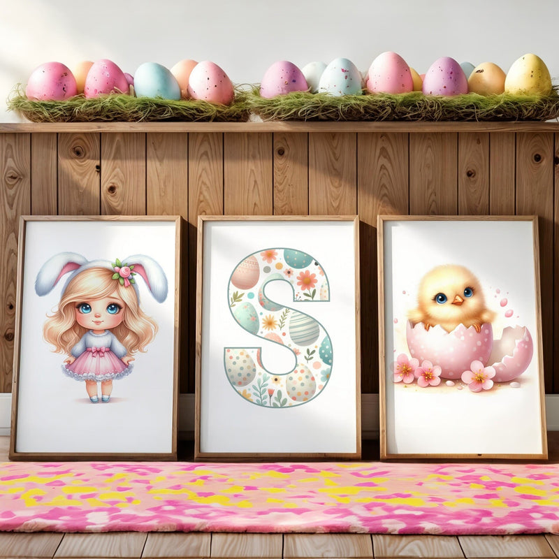 Three Easter Framed Childrens prints - one blonde haired girl dressed as bunny, a chick, and a patterned initial letter