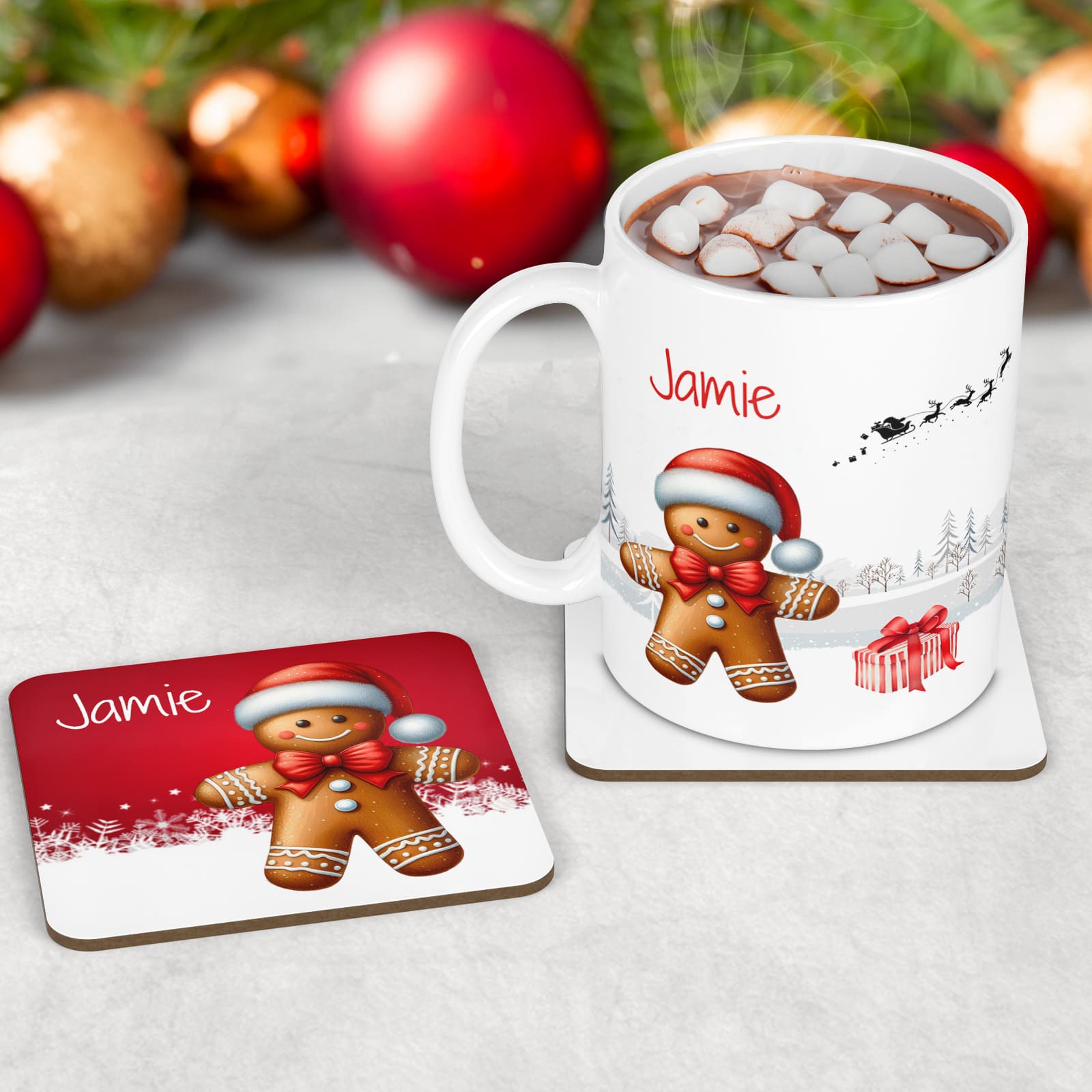Kids Christmas Table Wear Set. A white mug featuring bright, bold gingerbread man design. Coaster and placemat have similar design on a bright red background. All personalised with childs name