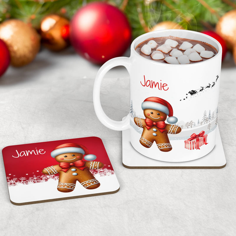 Kids Christmas Table Wear Set. A white mug featuring bright, bold gingerbread man design. Coaster and placemat have similar design on a bright red background. All personalised with childs name