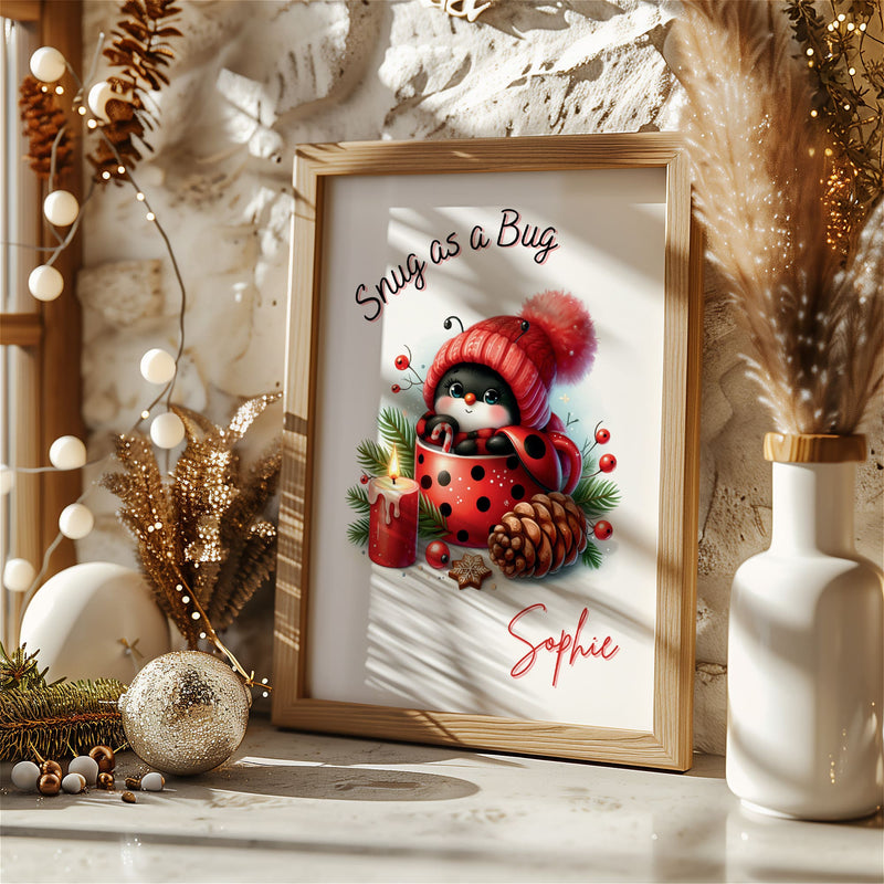 Personalised christmas nursery print featuring a delightful illustration of a ladybug snug in a spotty mug, complete with a woolly hat and surrounded by winter foliage.