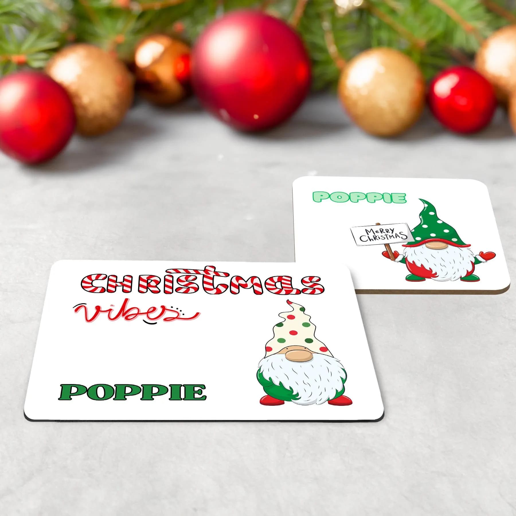 Childrens table wear set of 3 - mug, coaster and placemat featuring vibrant fun christmas gonk design on a white background. Personalised with childs name