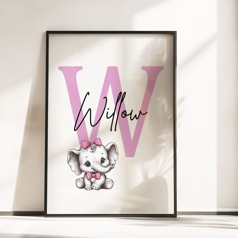 Set of three A4 prints in the style of pencil drawings. Each print features a cartoon baby giraffe, baby elephant, and baby zebra in black and white. They all wear a pink bow, with a few small pink hearts in the background. The middle image contains the elephant, which is smaller than the other two images. In the background, there is a large initial with a personalised name in black.