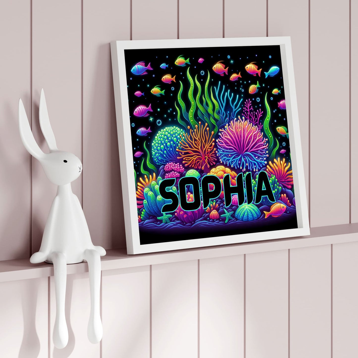 Set of 3 square nursery prints. A neon underwater design featuring seahorse, coral and jellyfish, on a black background. One print personalised with childs name