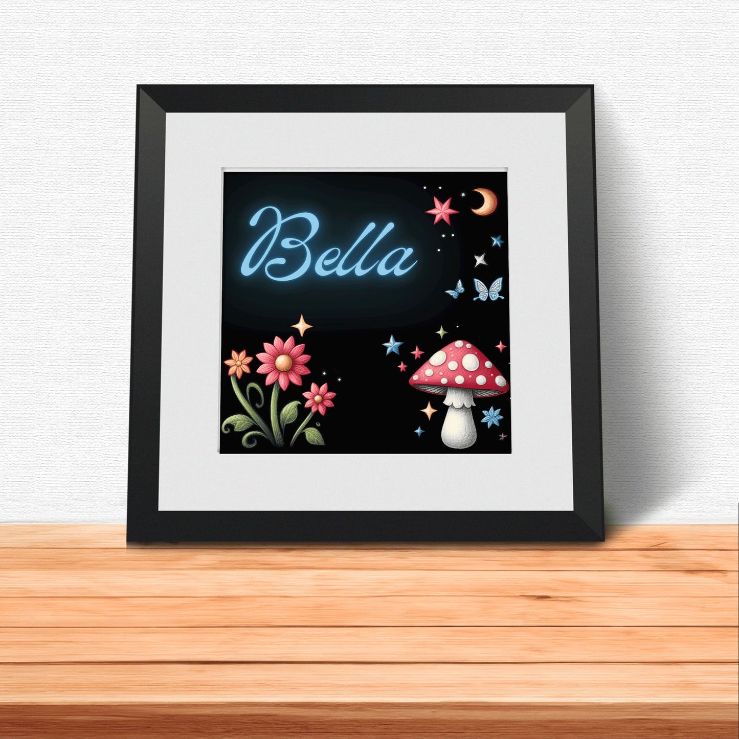 Three black square nursery prints. Featuring bright, colourful illustrations showing unicorn, fairy, rainbow, toadstools against black background. One print is personalised with your child's name