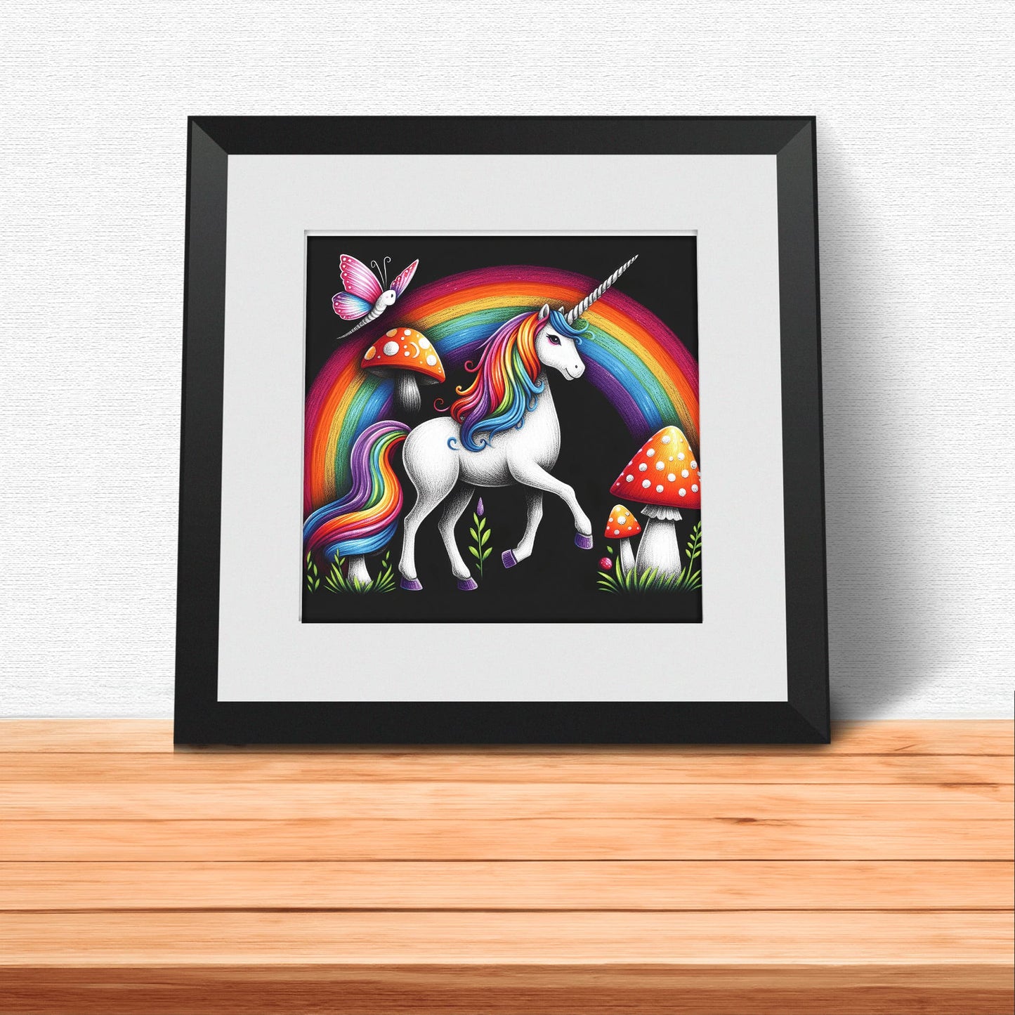 Three black square nursery prints. Featuring bright, colourful illustrations showing unicorn, fairy, rainbow, toadstools against black background. One print is personalised with your child's name