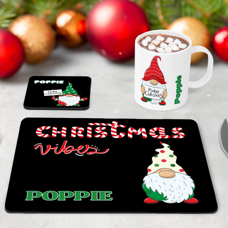 Childrens table wear set of 3 - mug, coaster and placemat featuring vibrant fun christmas gonk design on a black background (mug white background) Personalised with childs name