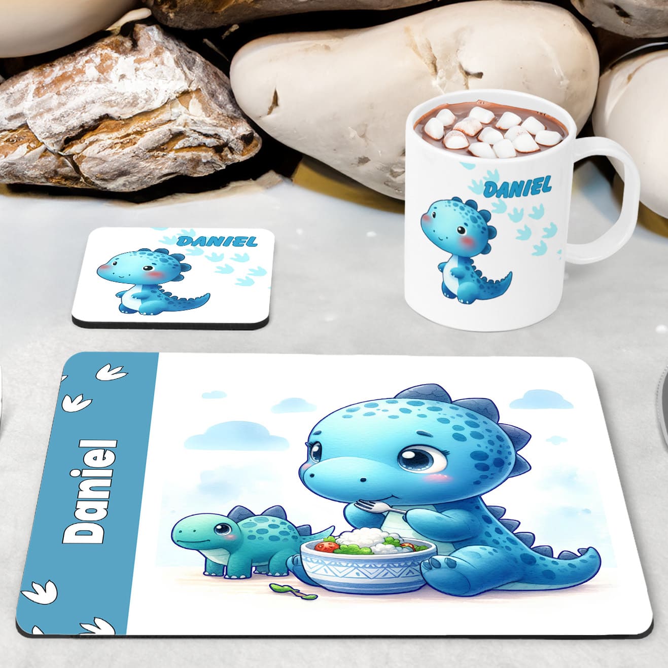 White Placemat, Mug and Coaster Set with adorable blue dinosaur design. Personalised with Childs name