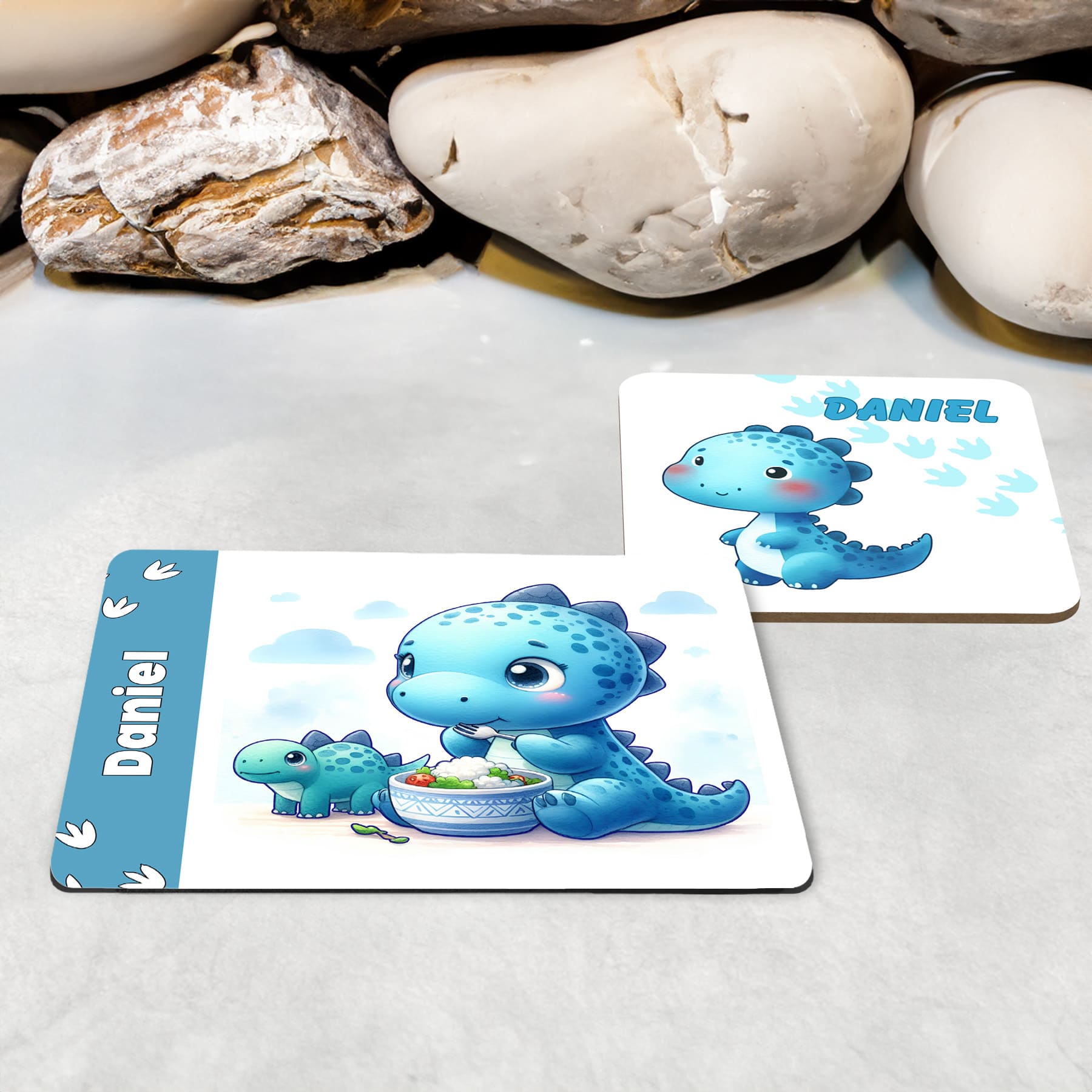 White Placemat and Coaster Set with adorable blue dinosaur design. Personalised with Childs name