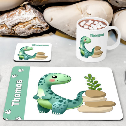 White Placemat, Mug and Coaster Set with cute turquoise dinosaur design. Personalised with Childs name
