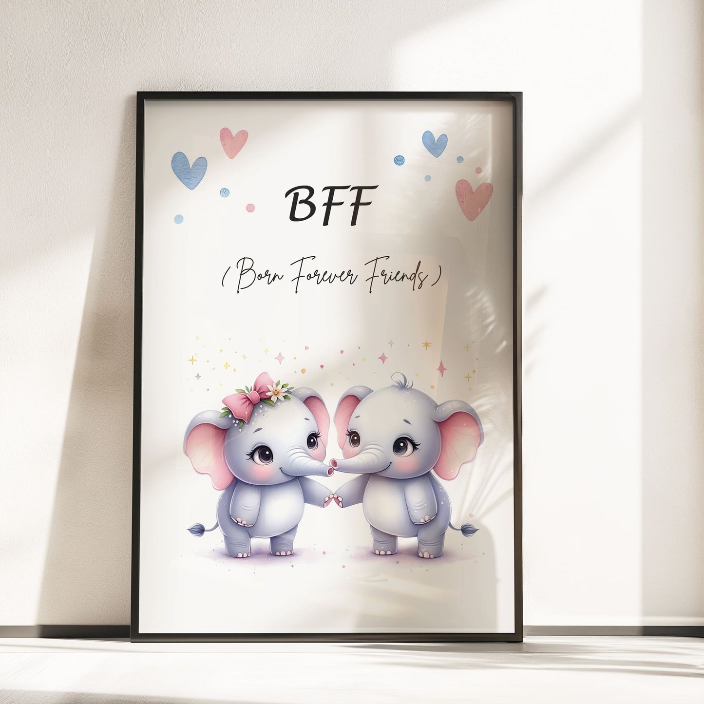 Two A4 Prints. One showing 2 cartoon twin elephants and reads "BFF Born Forever Friends". The other print has pink watercolour splatters, with children's name in black writing across it