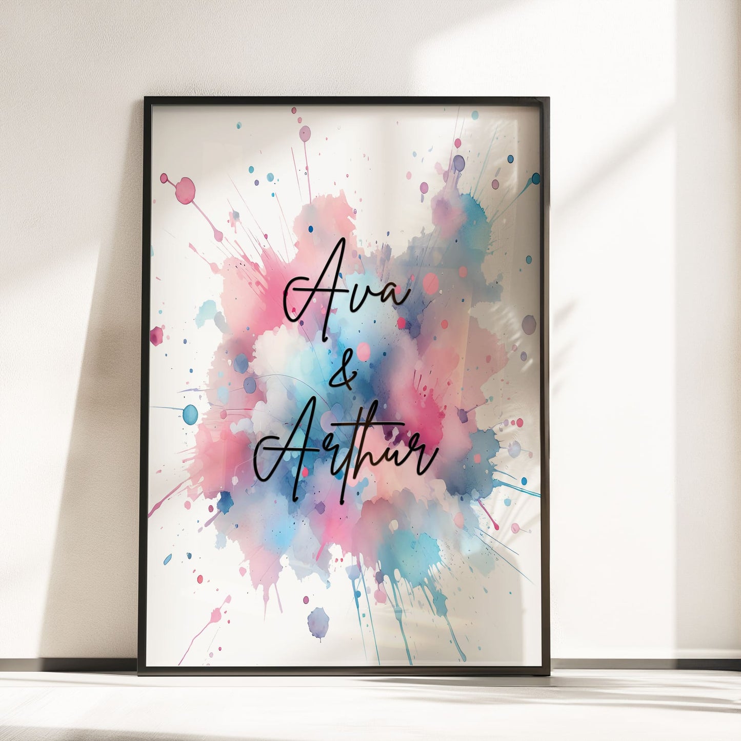 Two A4 Prints. One showing 2 cartoon twin elephants and reads "BFF Born Forever Friends". The other print has pink watercolour splatters, with children's name in black writing across it