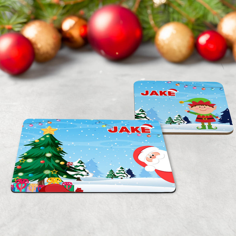 Kids Christmas Mug, Coaster and placement set featuring a bright blue background with christmas trees and santa/elf/reindeer cartoon design. All personalised with childs name