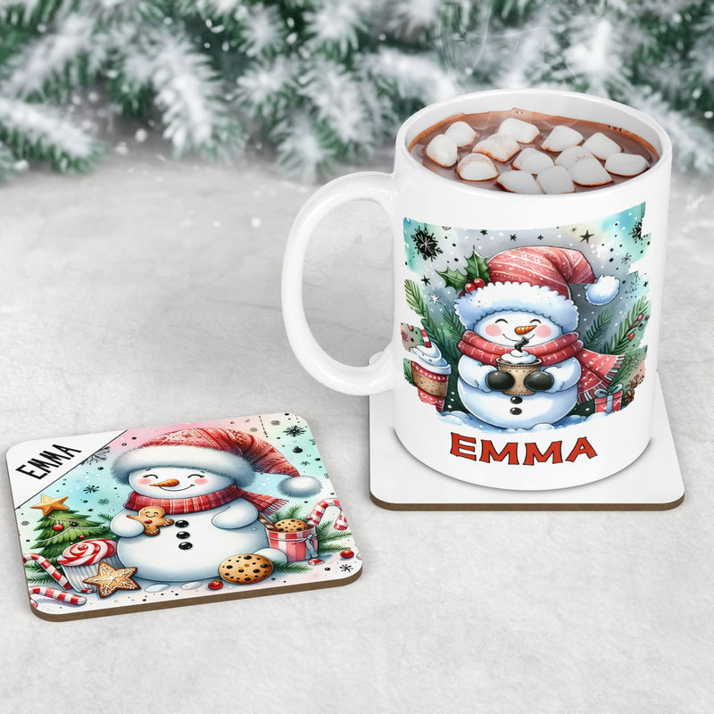 Childrens christmas mug and coaster set. Featuring bright and colourful snowman designs - one drinking hot chocolate and one eating cookies. Personalised with childs name
