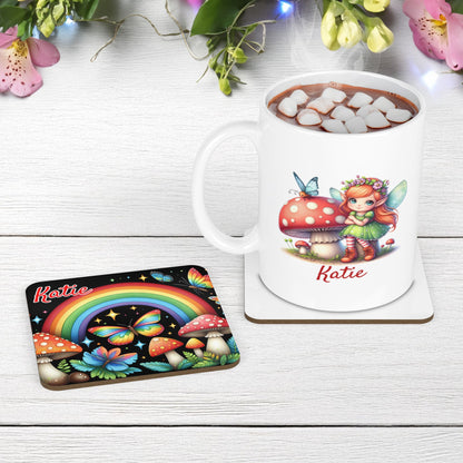 Fairy Garden mug and coaster set. Multicoloured rainbows, butterflies and toadstools pops on the black coaster, while the while mug features a winged fairy. Both items personalised with name of your choice