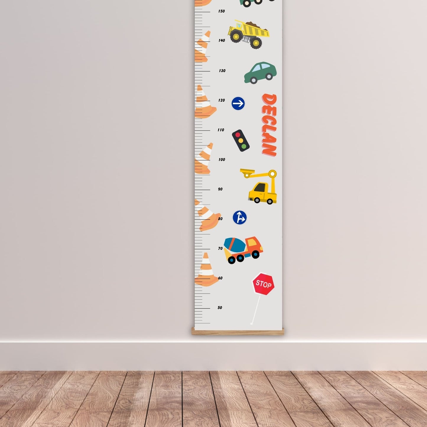 Personalised childs height hart in a neutral colour with cars, trucks, traffic cones and signs. Available on a black, white or natural hanger