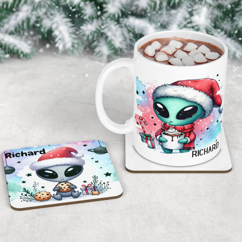 Christmas dinnerware set for kids, personalised with child’s name. Includes custom alien-themed placemat, coaster, and mug. Unique holiday gift idea for children; vibrant colours & fun alien design make it ideal for festive table decor and Christmas