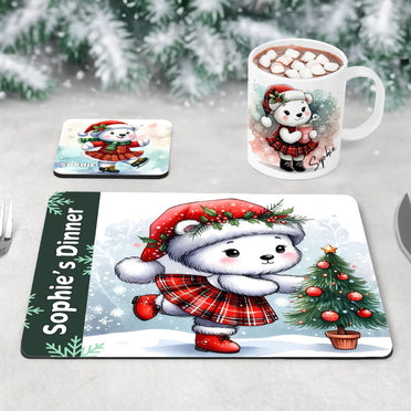 Three piece childrens table set - mug, coaster and placemat. All feature highland dancing polar bear designs, in festive reds and greens. All personalised with childs name