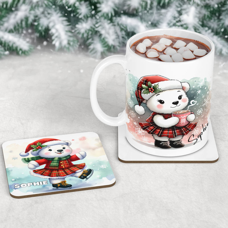 Three piece childrens table set - mug, coaster and placemat. All feature highland dancing polar bear designs, in festive reds and greens. All personalised with childs name