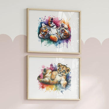 Set of two horizontal A4 prints featuring multicoloured animals - tiger cub and lion cub. The animals are depicted in a vibrant watercolour style with multiple colours. The prints are very bright and colourful, adding a lively touch to any space.