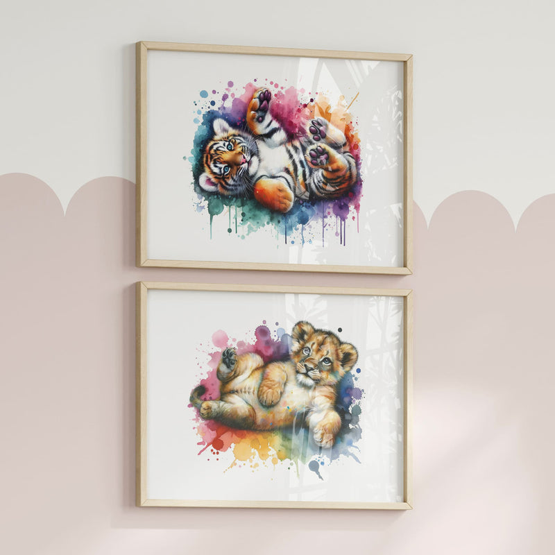 Set of two horizontal A4 prints featuring multicoloured animals - tiger cub and lion cub. The animals are depicted in a vibrant watercolour style with multiple colours. The prints are very bright and colourful, adding a lively touch to any space.