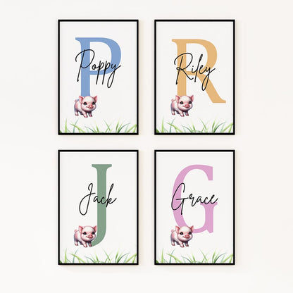 Image featuring four prints, each with a small pig image overlaid on a large initial in the background. The initials in each print are of different colours, with a personalised name written across them.