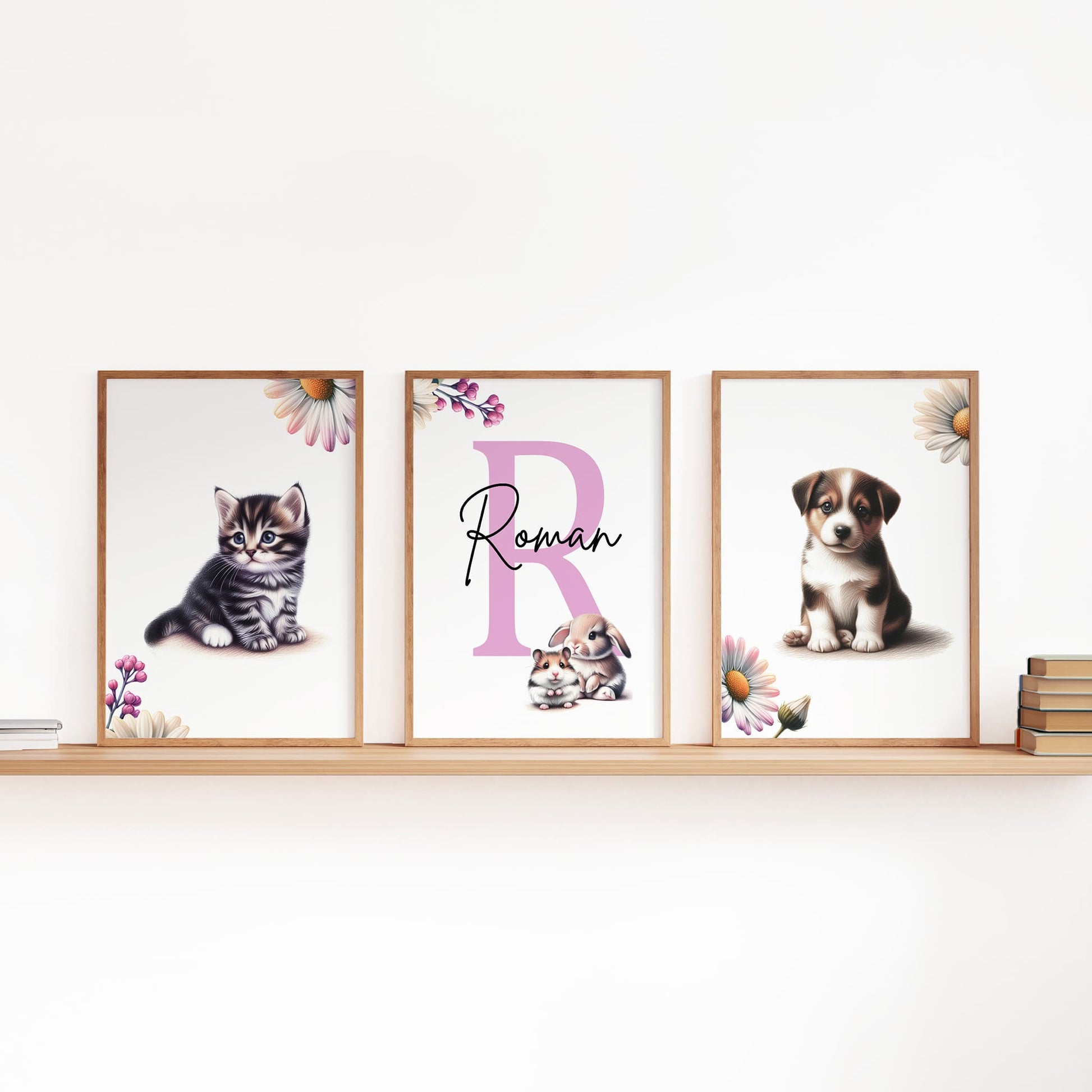 Set of three A4 prints featuring cute pets - puppy, kitten, rabbit, and hamster. The animals are depicted in a cute style resembling coloured pencil drawings. Simple flowers decorate the edges of the prints. The middle print features a smaller animal than the others, with a large initial letter in the background. A personalised name in black overlays the initial letter.