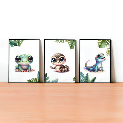 Set of three A4 prints featuring reptiles/amphibians - tree frog, lizard, and snake. The animals are depicted in a cartoony, bright style resembling coloured pencil drawings. Jungle-style leaves decorate the edges of the prints.