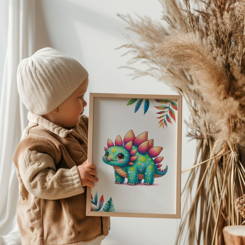Set of three A4 prints featuring cute baby dinosaurs. The dinosaurs are depicted in a cute, cartoony, bright style resembling coloured pencil drawings. Rainbow coloured leaves decorate the edges of the prints. The middle print features a smaller dinosaur than the others, with a large initial letter in the background. A personalised name in black overlays the initial letter.