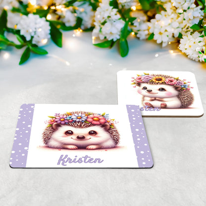 White placemat and coaster set with adorable hedgehog wearing a flower crown. Personalised with your childs name in lilac