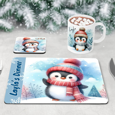 Personalised Mug, Coaster and Placemat set for Childrens Christmas. Featuring soft, adorable penguins dressed in hats and scarves and customised with childrens name