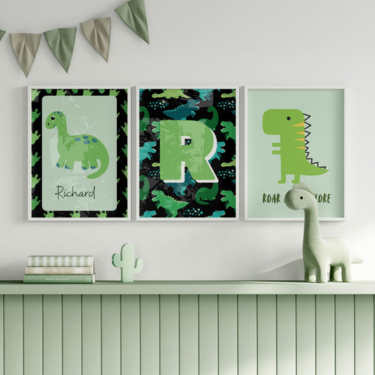 3 Simple, bright dinosaur nursery prints in greens and black. One with a dinosaur illustration and reads "roar and explore", one with a dinosaur pattern on a black background and childs initial in bold green, third print with a dinosaur and childs name