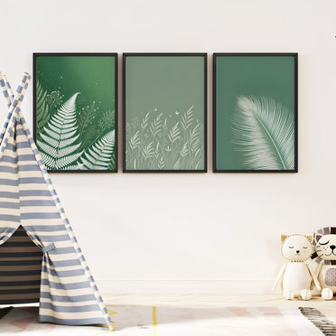 Three botanical prints featuring white fern and leaf patterns on various green shades, bringing a fresh and natural feel to any space.