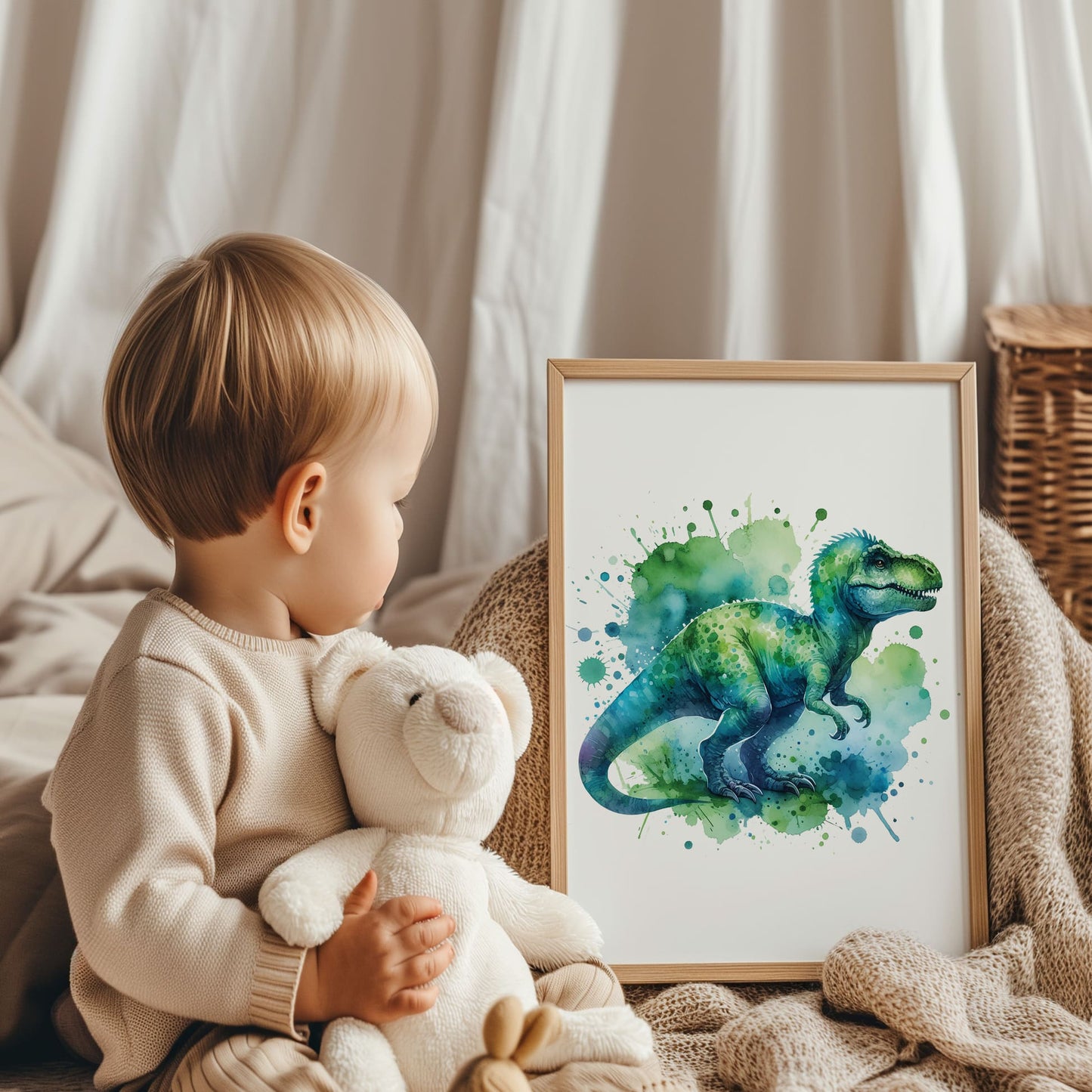 Set of 2 green/blue prints for children's nursery décor. One print feature vibrant, green/blue dinosaur in watercolour effects, while the second showcases watercolour splashes with a white initial letter and personalised black name