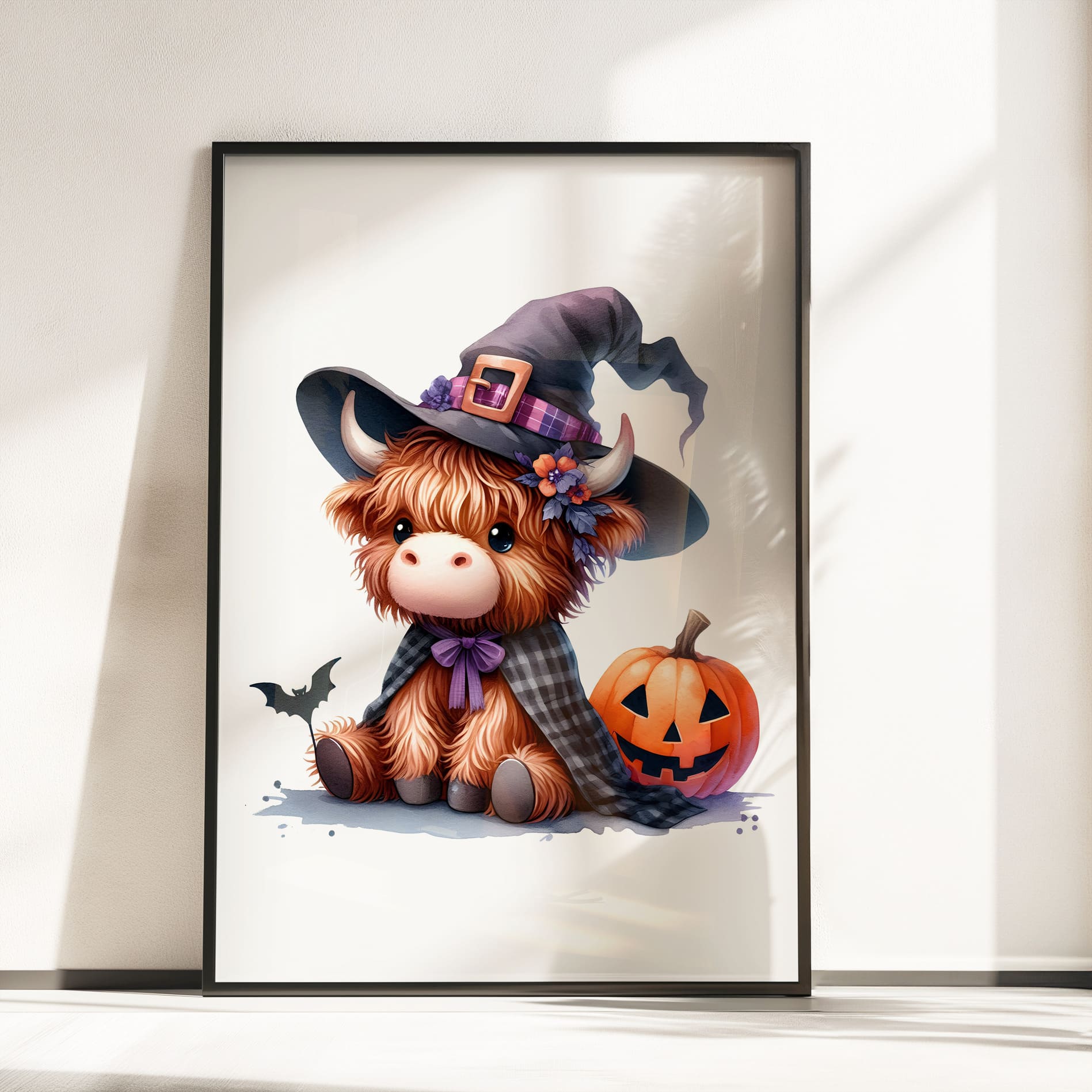 Three prints of cute Highland cows dressed as a witch, a pumpkin-themed cow, and a scarecrow, perfect for Halloween nursery decor.
