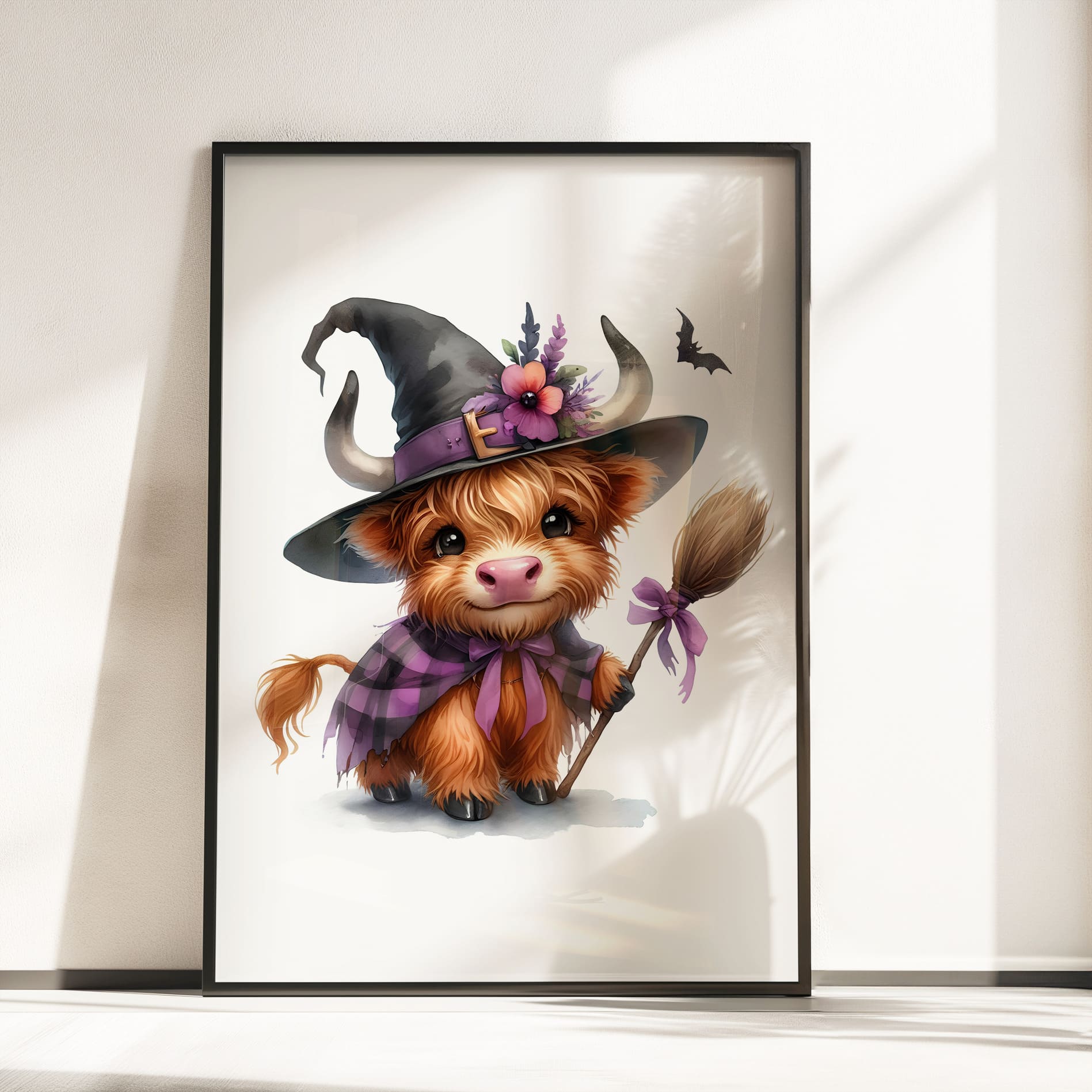 Three prints of cute Highland cows in witch costumes, holding magical props and pumpkins, perfect for Halloween nursery wall art.