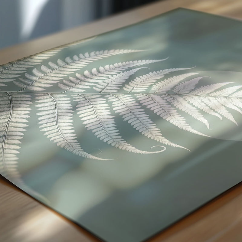 Three botanical nursery prints with white fern and leaf illustrations on soft green tones, featuring a stylish abstract circle for a unique, modern touch.