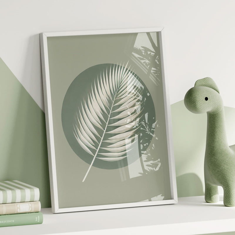 Three botanical nursery prints with white fern and leaf illustrations on soft green tones, featuring a stylish abstract circle for a unique, modern touch.