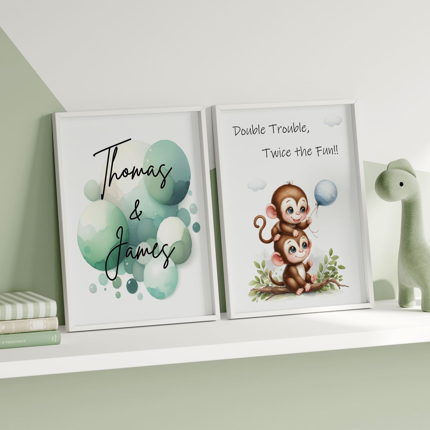 Set of 2 personalised prints for twins' nursery décor. One print features two cute monkeys playing, while the other showcases vibrant watercolour splashes overlaid with children's names in bold black lettering