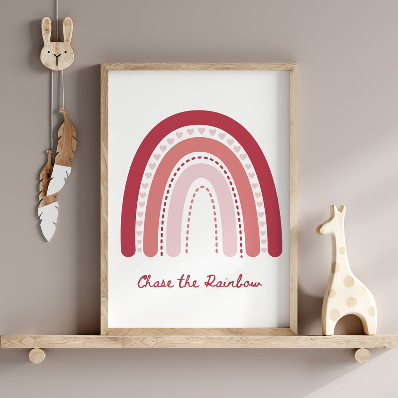 3 boho style nursery prints in shades of pink. One print with a boho pink rainbow, one with a spotty black and white background, and childs initial, one with daisys and childs name