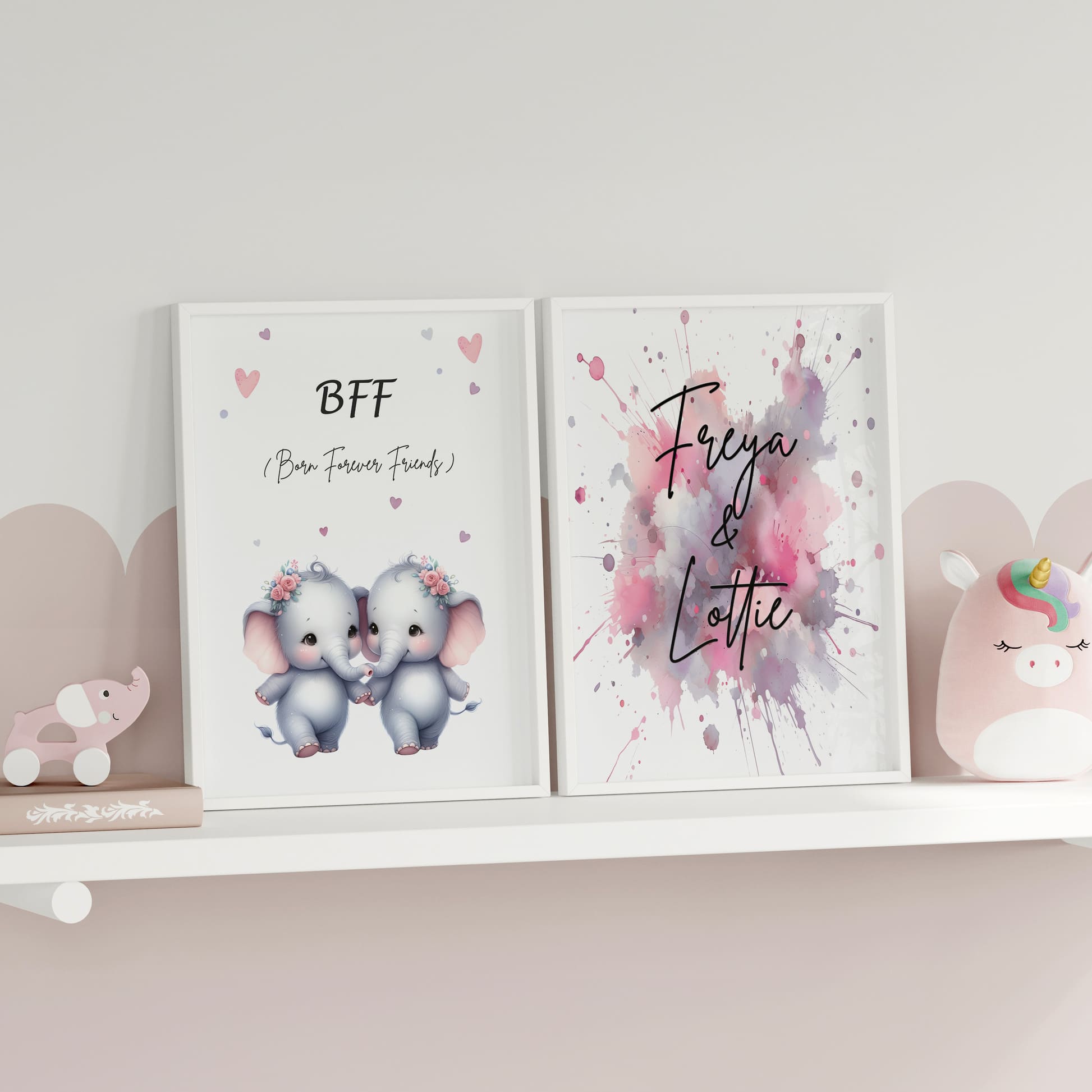 Two A4 Prints. One showing 2 cartoon twin girl elephants and reads "BFF Born Forever Friends". The other print has pink watercolour splatters, with children's name in black writing across it
