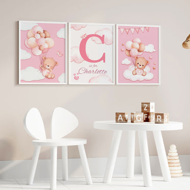 3 Nursery Prints in Shades of Baby Pink - Featuring watercolour style teddy bears, balloons and clouds. One print features childs name and initial over floating clouds background