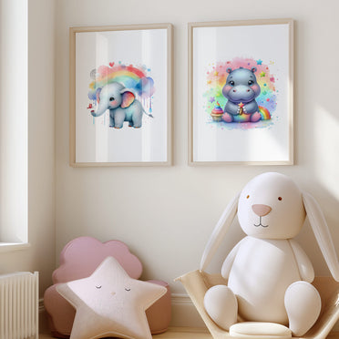 Set of two A4 prints featuring cute cartoon watercolour style elephant and hippo. Behind the animals are bright rainbow effect. Adorned with small hearts and stars. The prints are bright and colourful, adding a vibrant touch to any space.