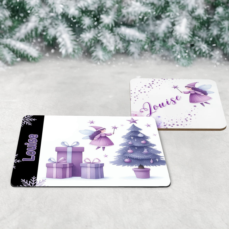 Childrens Christmas tablewear set. A mug, coaster and placement featuring christmas fairy designs in shades of purple. All personalised with childs name