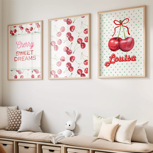 Cherry print nursery wall decor set of three – includes a sweet cherry pattern, a print with the words "Cherry Sweet Dreams", and a personalised cherry illustration with your child’s name. Bright and playful fruit-themed room decor for babies and kids.