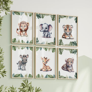 Set of six A4 prints featuring safari animals - lion cub, tiger cub, cheetah cub, elephant, giraffe, and zebra. The animals are depicted as baby animals, in a cartoony and bright style reminiscent of coloured pencil drawings. Jungle-style leaves adorn the edges of the prints.