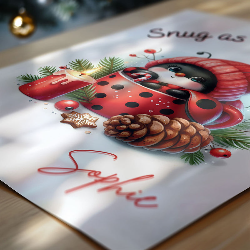 Personalised christmas nursery print featuring a delightful illustration of a ladybug snug in a spotty mug, complete with a woolly hat and surrounded by winter foliage.