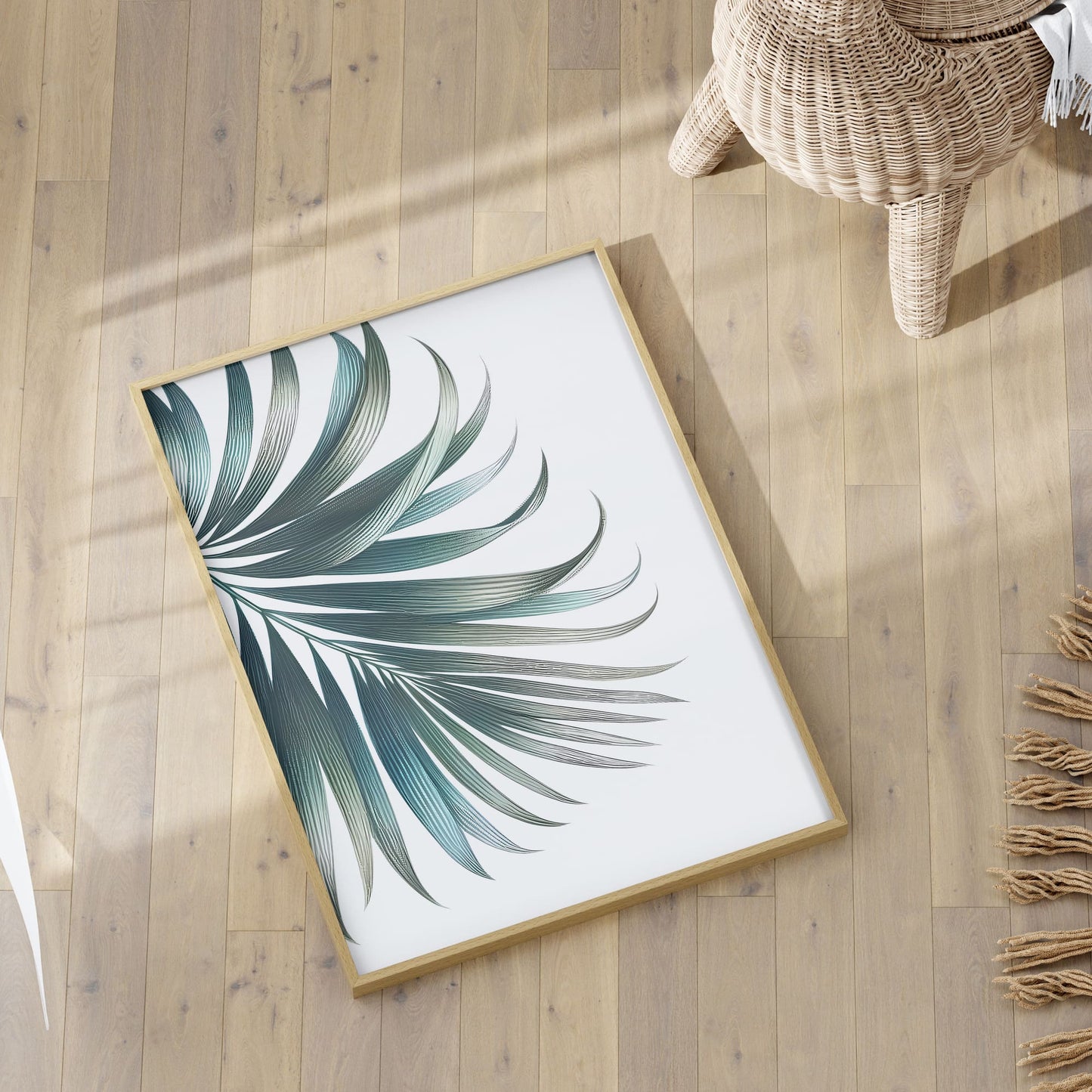 Three botanical prints featuring muted green leaves, including fern, eucalyptus, and palm, on a white background for a soft, elegant nursery aesthetic.