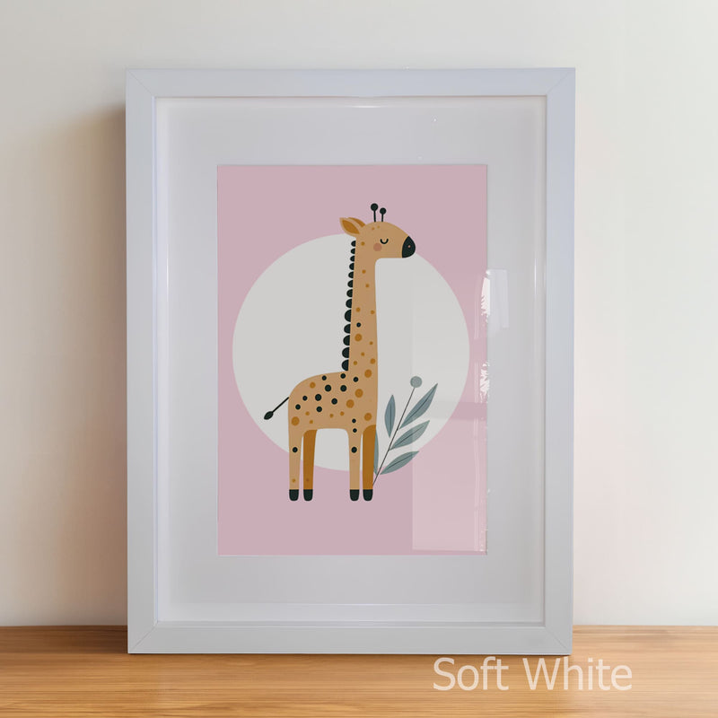 Framed artwork of a giraffe on a pink background with a white frame.